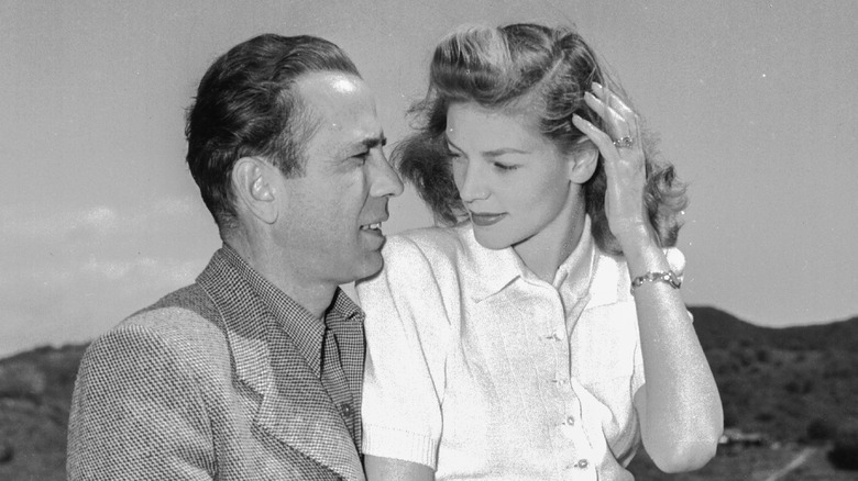 Bogart Bacall look at each other