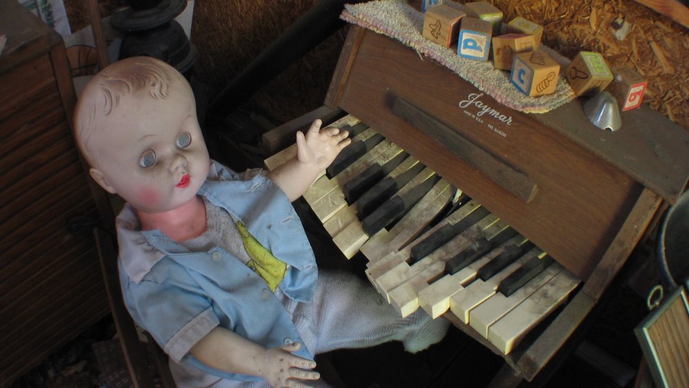 Creepy doll at piano