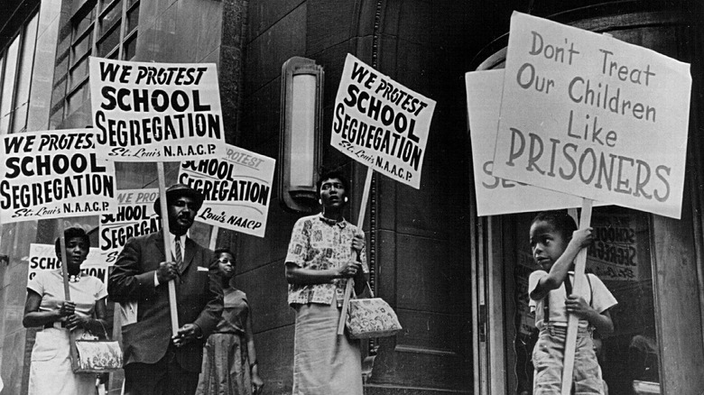 civil rights protestors holding signs