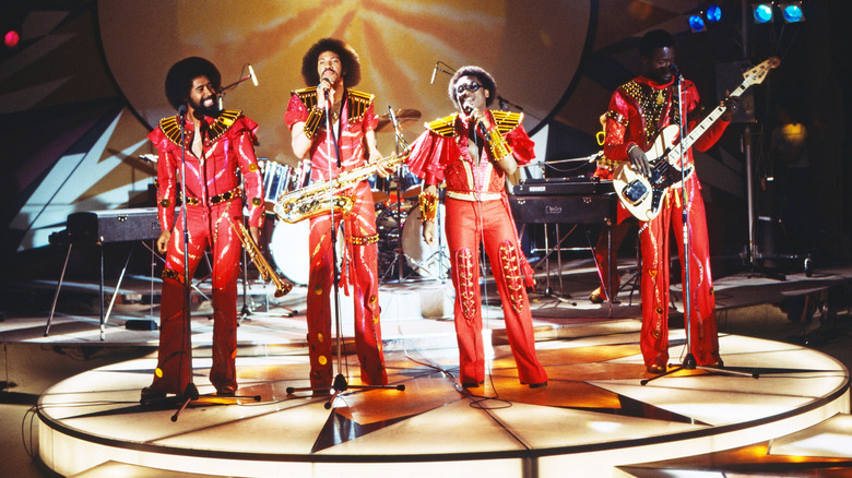 The Commodores perform on stage