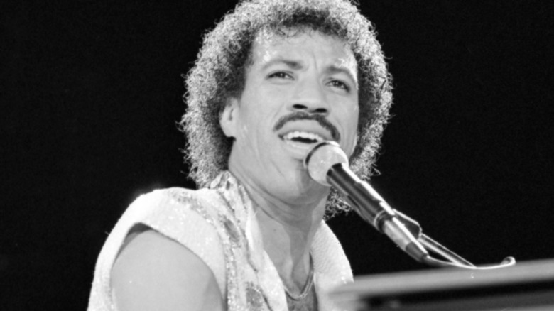 Lionel Richie performs at the piano