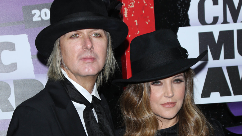 Lisa Marie Presley and Michael Lockwood posing for photos