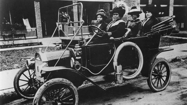 Madam Walker driving her car