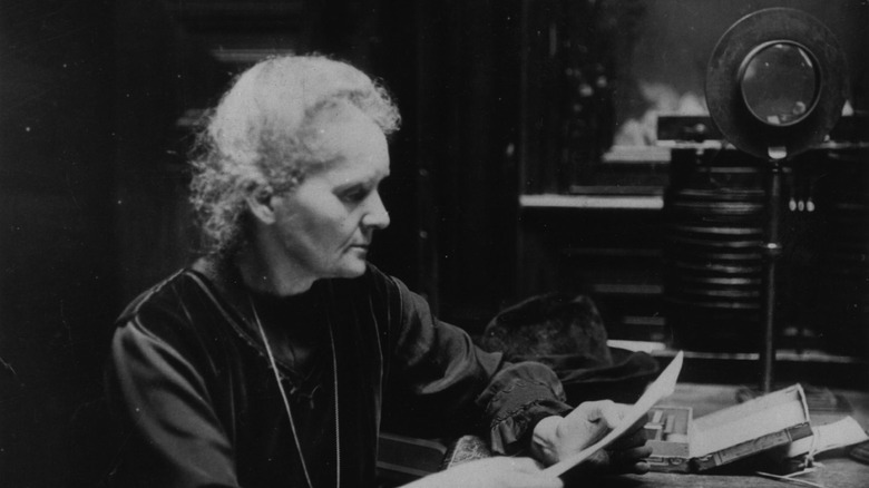 Scientist Marie Curie reading