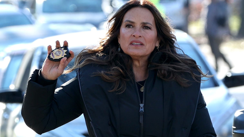 Mariska Hargitay on set with badge