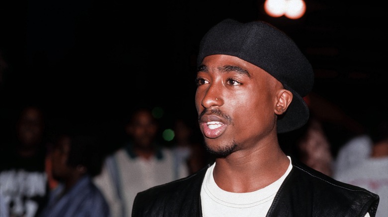 Tupac Shakur in cap and nose ring