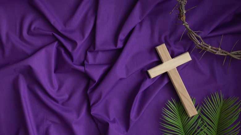 Christian imagery against purple backdrop