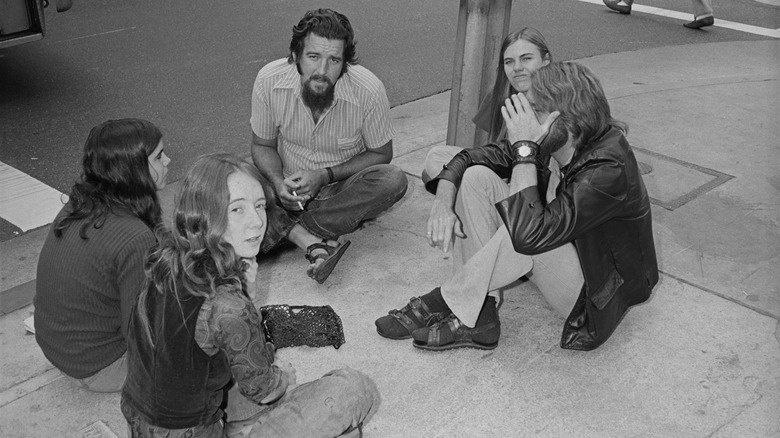 Manson Family members sitting down