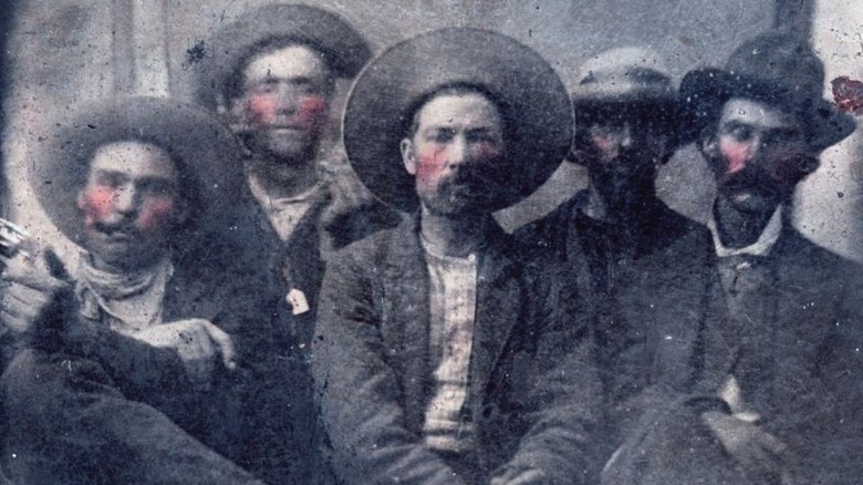 purported image of Billy the Kid (back left) and Pat Garrett (far right)