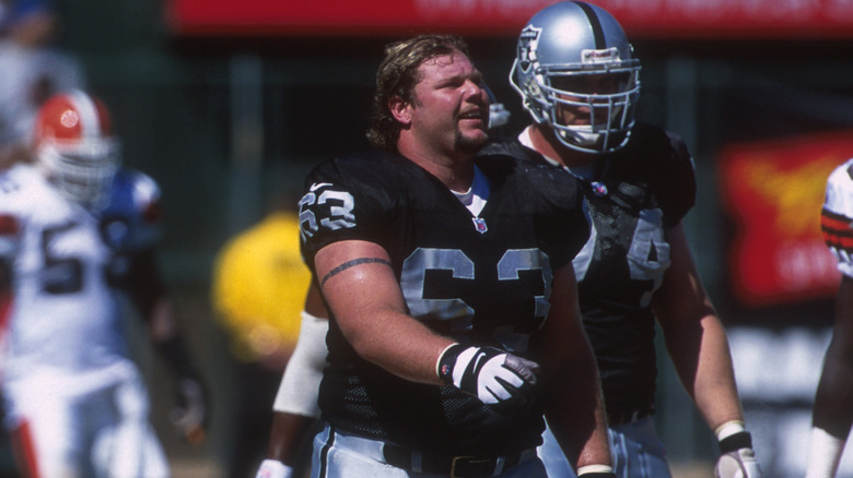 Barret Robbins walking on field