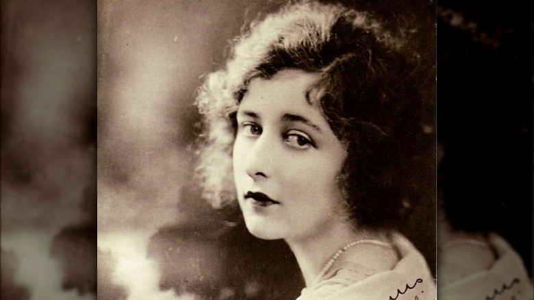 Mildred Harris posing