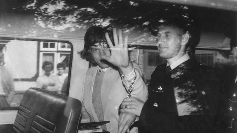 Mick Jagger in handcuffs