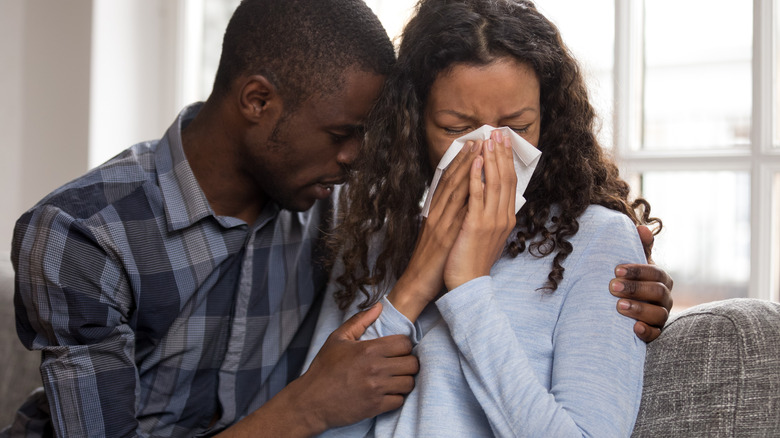 black couple crying