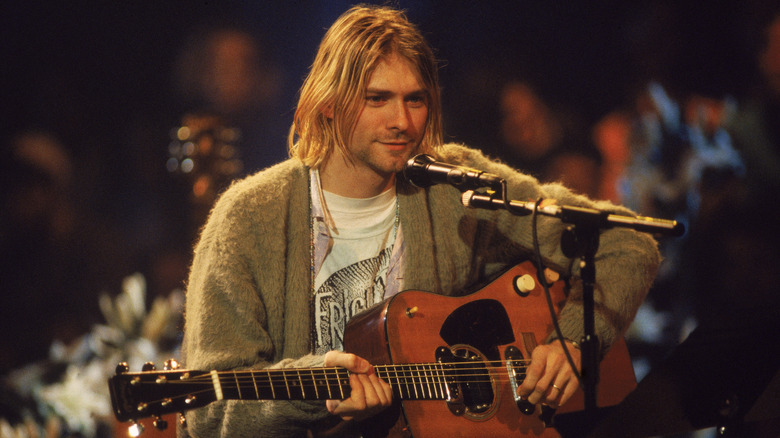 Kurt Cobain singing and playing the guitar on MTV Unplugged in 1993
