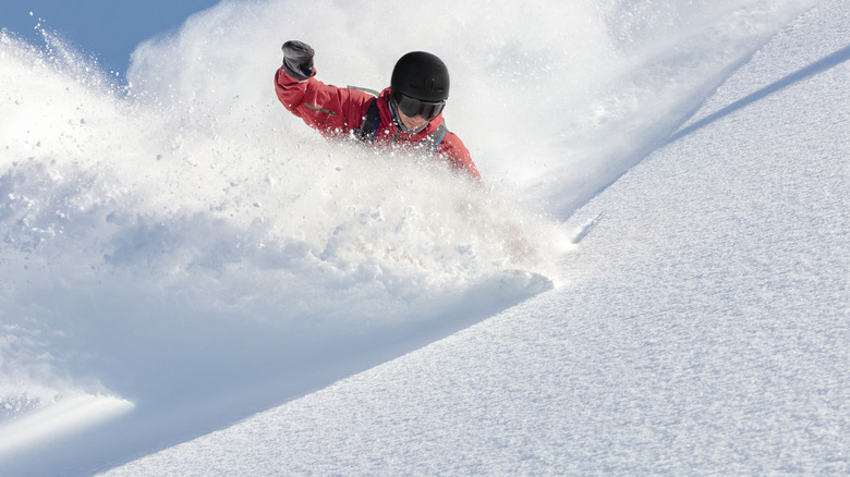 a competitor snowboarding