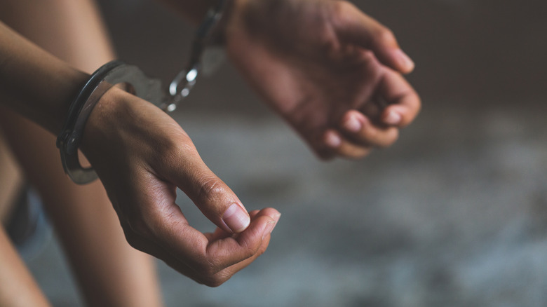 woman in handcuffs