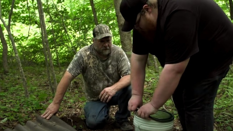 Jeff Waldroup and his son on Moonshiners
