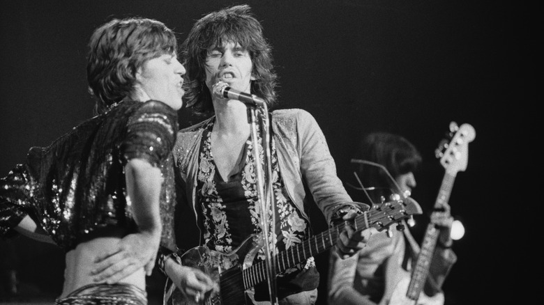 The Stones singing on stage