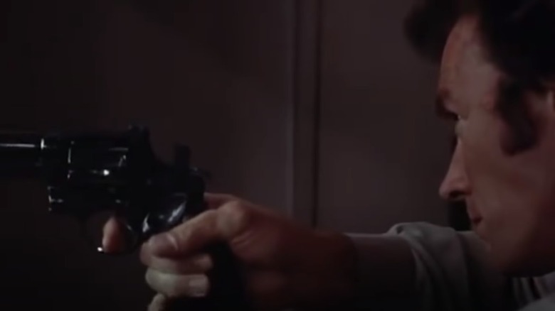 dirty harry pointing a gun