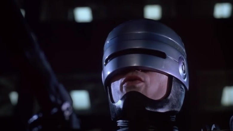 robocop pulling a gun