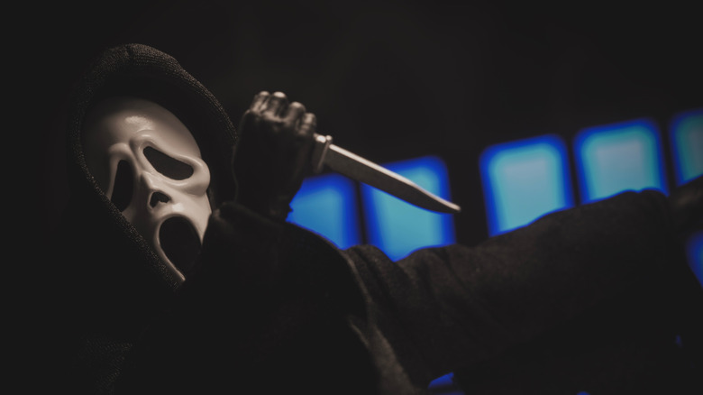 Ghostface robe dagger dark background