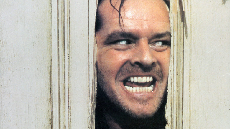 Jack Nicholson grinning door crack The Shining