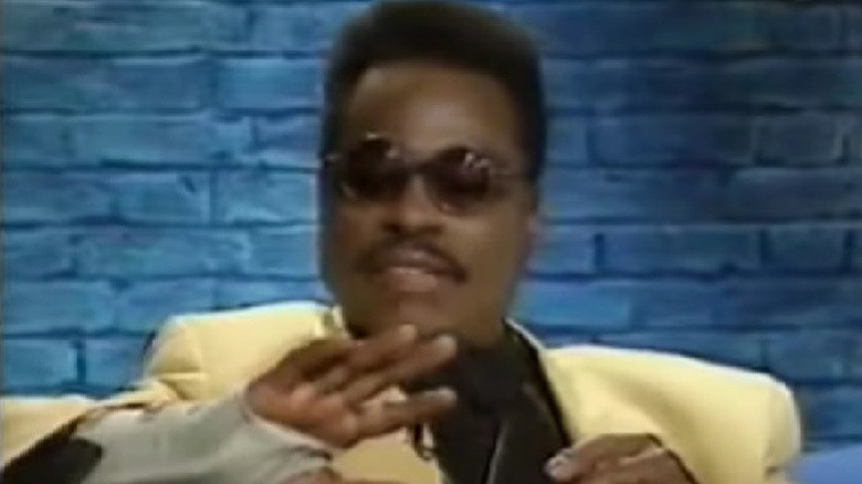 David Williams gesturing during an interview