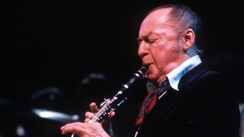 Woody Herman playing clarinet onstage