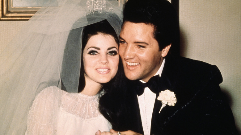 Priscilla and Elvis Presley at their wedding