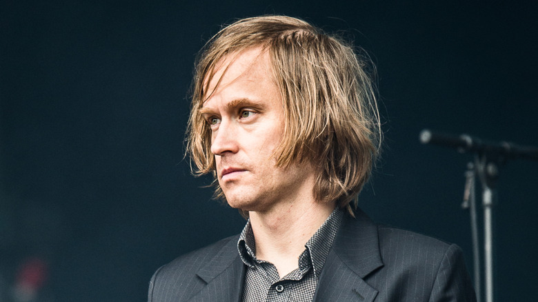 denniz lyxzen of refused looks off while on stage