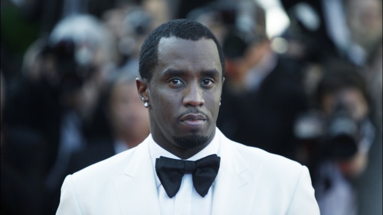 Sean Combs wearing white tuxedo