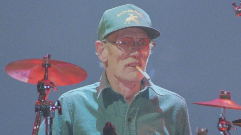 Ginger Baker playing drums on stage