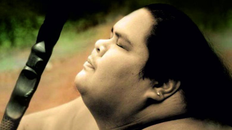 Israel Kamakawiwo'ole playing instrument