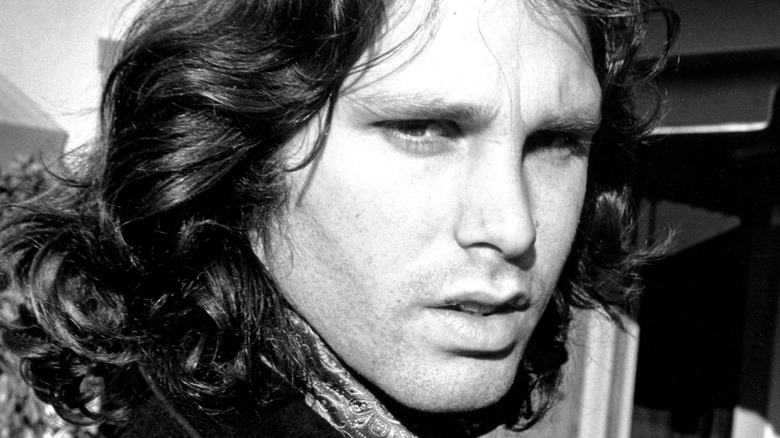 Jim Morrison sullen long black hair