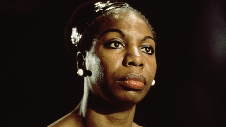 Nina Simone looking forward neutral on stage