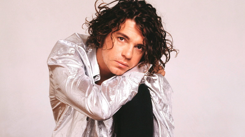 Michael Hutchence posing