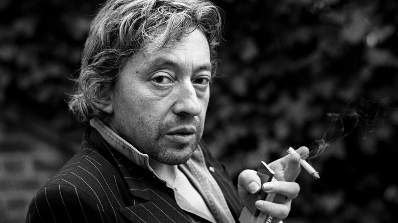 Serge Gainsbourg smoking