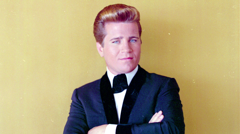 Johnny Burnette pompadour crossed arms