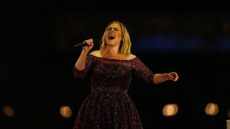 Adele performing in concert