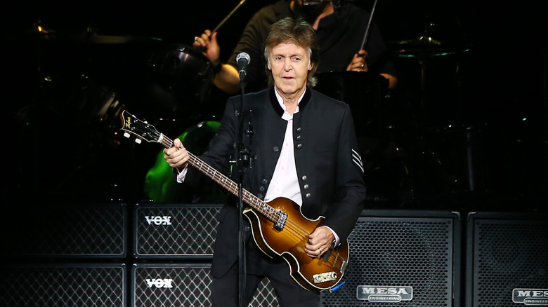 Paul McCartney performing in concert