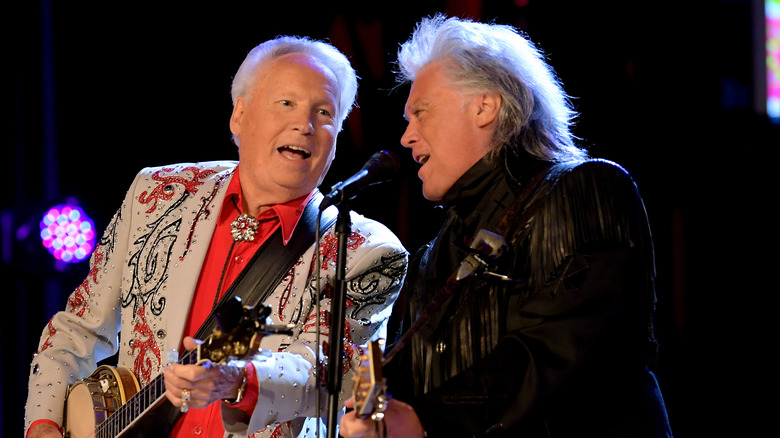 Buck Trent and Marty Stuart performing onstage