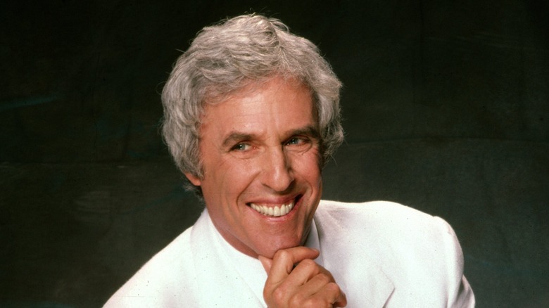 Burt Bacharach smiling hand on chin