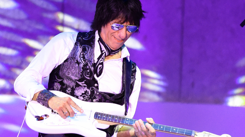 Jeff Beck playing guitar onstage in 2018