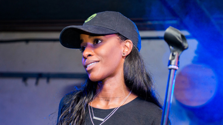 Angel Haze wearing baseball cap