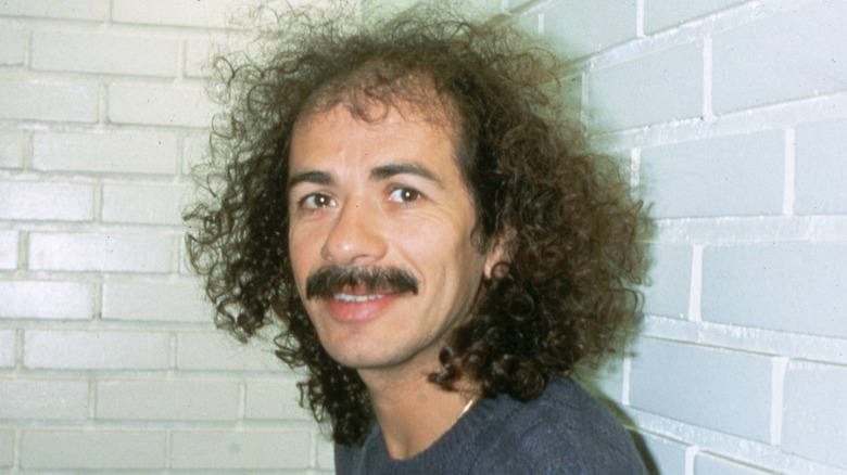 Carlos Santana mustache scraggly hair