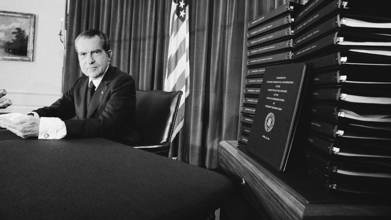 Nixon next to tape transcripts