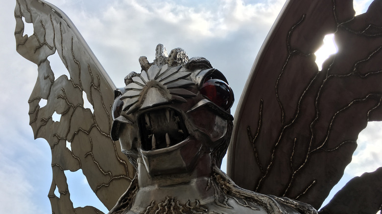 A Mothman monument looks at the area