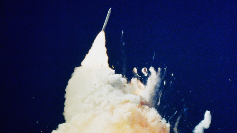 smoke and debris is sky after Challenger breakup