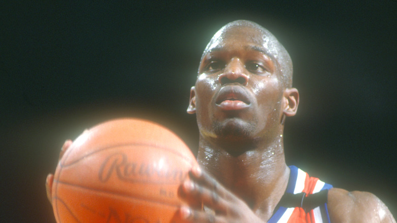 Conrad McRae playing basketball