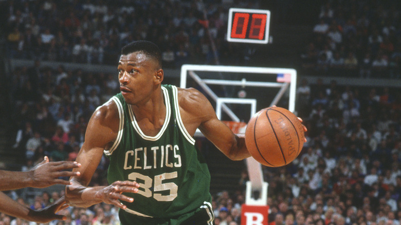 Reggie Lewis playing basketball